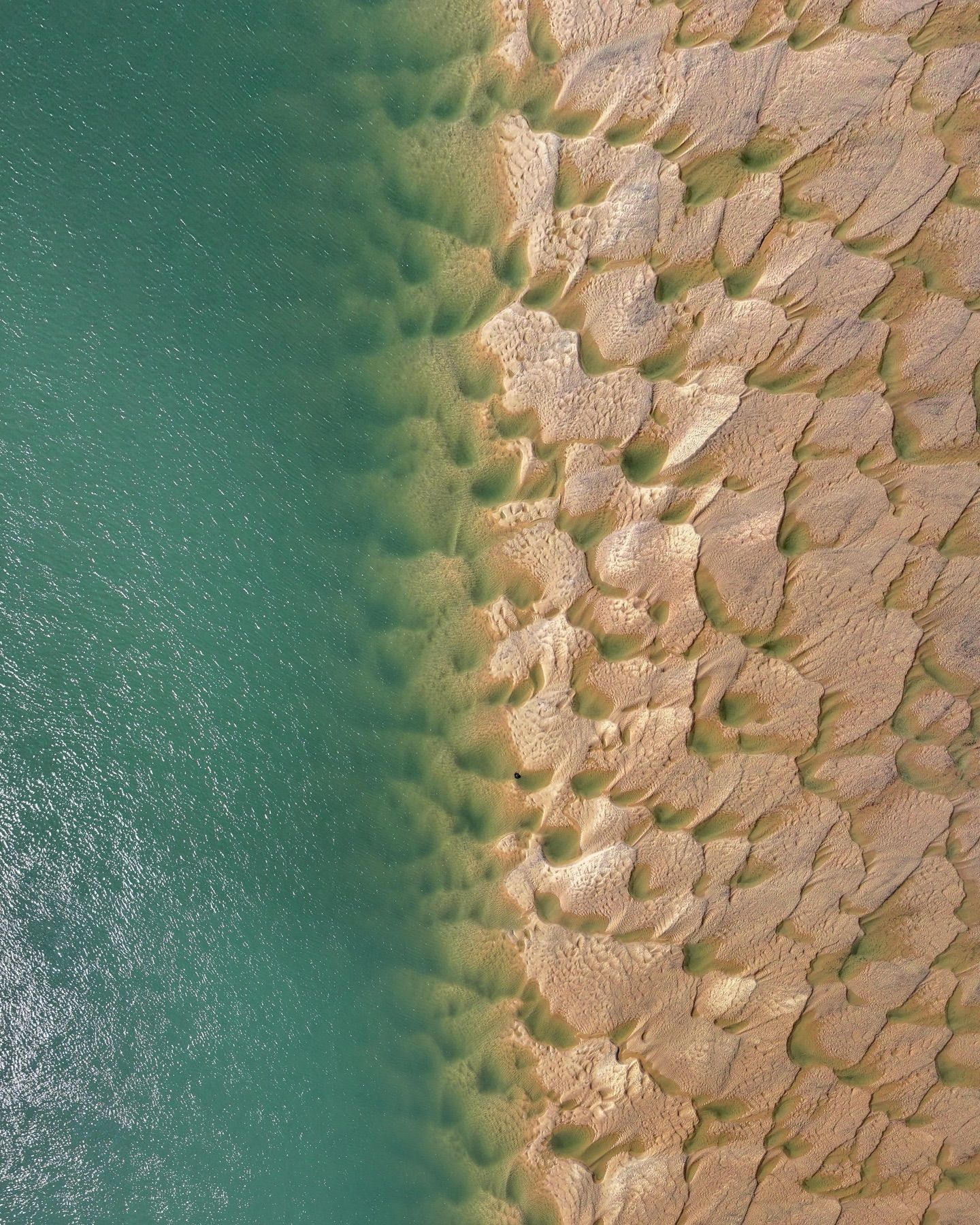 Sand banks under shallow turquoise water